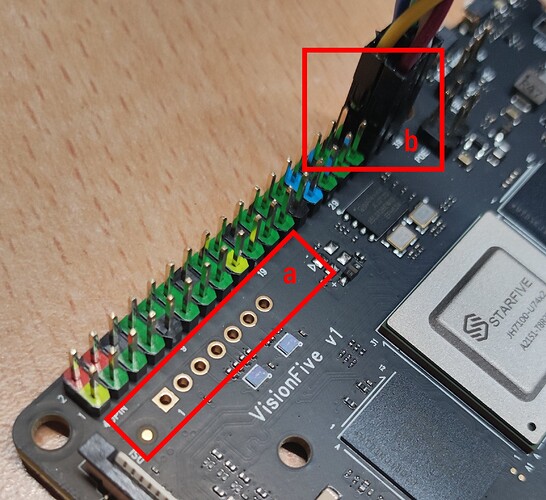 Photo of VisionFive showing two places where JTAG signals are found
